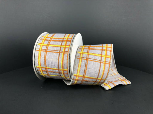 A 2.5X10Y spool of Grey-Rust-Yellow Cornelia Plaid Ribbon (61213-40-47) unfurls gracefully, displaying a gray base with vibrant yellow and orange stripes against a solid black background.
