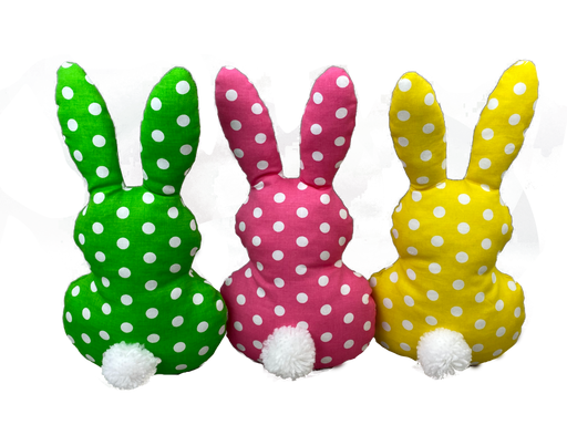 Three 12 by 6.5 Mixed Plush Bunny Pom Pom Tail toys (63228MIX) in green, pink, and yellow with white polka dots and cute pom pom tails are shown from the back.