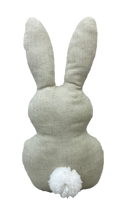 The 12 by 6.5 Natural Plush Bunny Pom Pom Tail 63252NAT is shown from behind, highlighting its beige fabric charm. With long ears and a fluffy pom-pom tail, its set against a plain black background.