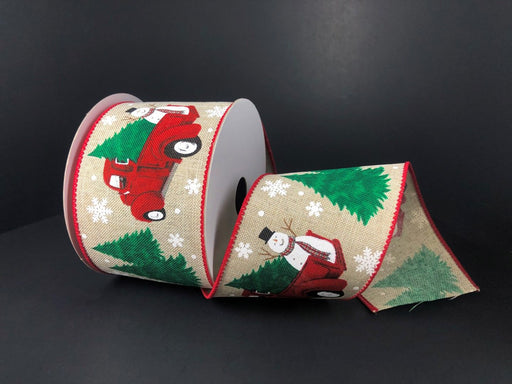 The Light Natural Linen/Frosty-Christmas Truck ribbon features festive designs, including red vintage trucks, snowmen, green Christmas trees, and white snowflakes on a dark background. It is elegantly bordered with a bold red edge and measures 2.5 by 10 yards (71077-40-12).