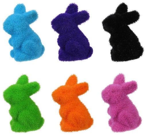 Six charming 4Hx2.5L flocked standing rabbits, available in purple, pink, black, green, turquoise, and yellow (HE723899), are arranged in two right-facing rows. Choose your favorite color for this soft polystyrene display.