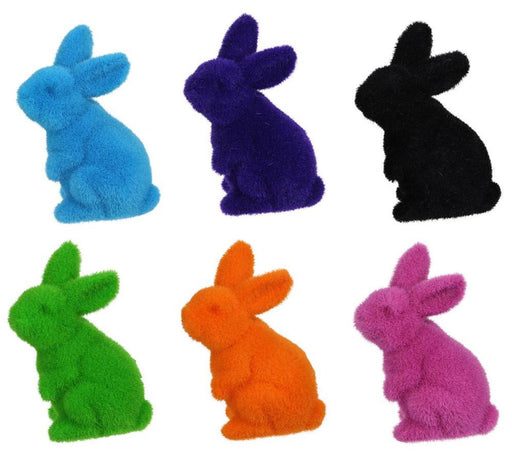 Displayed in assorted colors—turquoise, purple, black, green, orange, and pink—these 6H x 3.5L flocked standing rabbit figurines (HE724099) are crafted from a polystyrene/nylon blend with soft textures and striking poses.