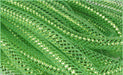 Close-up of intricately woven lime green netting with embedded shining lights, creating a textured lit pattern reminiscent of Deco Flex Tubing Lime Green with Lime Green Metallic Foil RE300456.