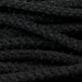 Close-up of Deco Flex Tubing Black Snowdrift RE322402, highlighting its textured braided design reminiscent of black cords. These parallel cords fill the frame with an elegance perfect for holiday creations.