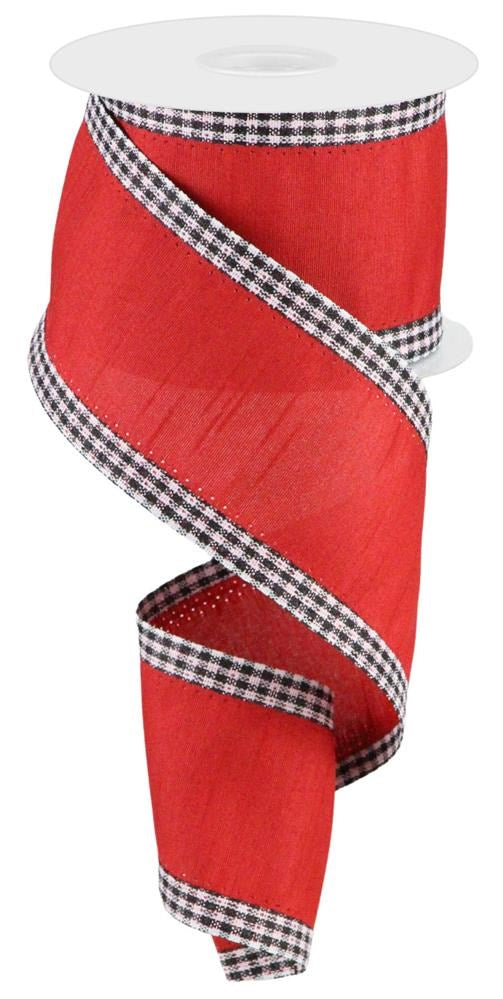 The 2.5X10Yd Faux Dupioni Mini Gingham Edge (RG0832124) features a red ribbon with black and white plaid edges, wound around a white reel, offering a smooth texture with decorative Mini Gingham edging.