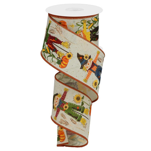 The 2.5 Cream Scarecrow Print Fall Ribbon (RGB1278C2) features cheerful scarecrows, pumpkins, sunflowers, and autumn leaves on cream fabric with a brown wire edge. The ribbon is shown unrolled in a spiral shape.
