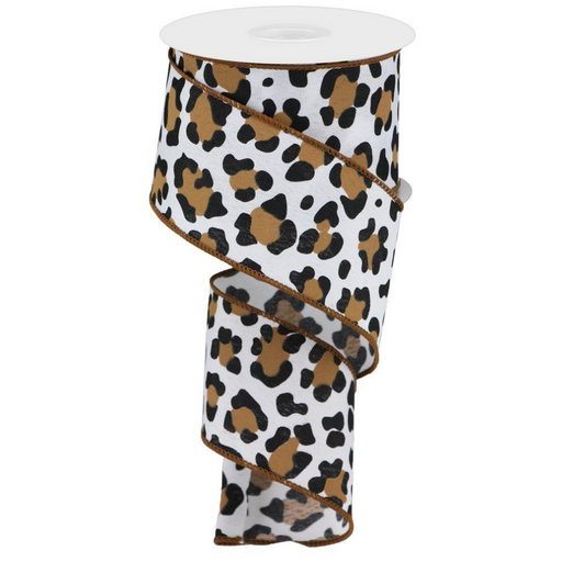 The 2.5” Leopard Print Brown Black Ribbon RGB139504 features brown, black, and tan spots on a white background with a wired edge, shown partially unrolled in a loose spiral.
