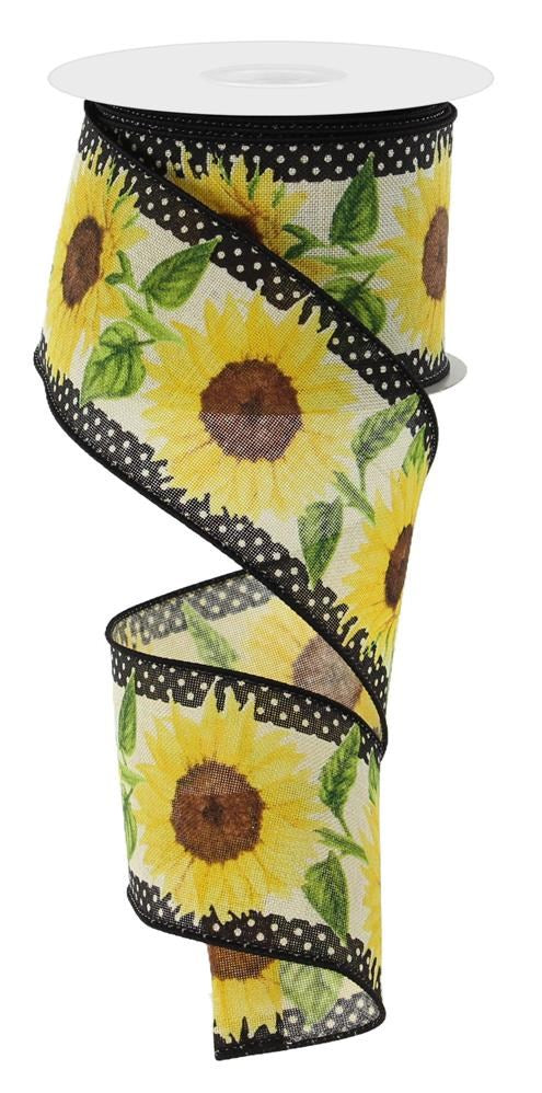 The 2.5X10Yd Sunflowers W/Polka Dots RGE1105C2 ribbon displays a charming pattern of large yellow sunflowers with green leaves and black borders with white polka dots, ideal for brightening any project.