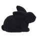 A matte black silicone mold shaped like a rabbit with a simple, stylized silhouette, perfect for creating vibrant polystyrene or nylon designs. Captures the charm of an 8.5L x 6H flocked laying rabbit in six assorted colors: purple, pink, black, green, orange, and turquoise (HE722999).