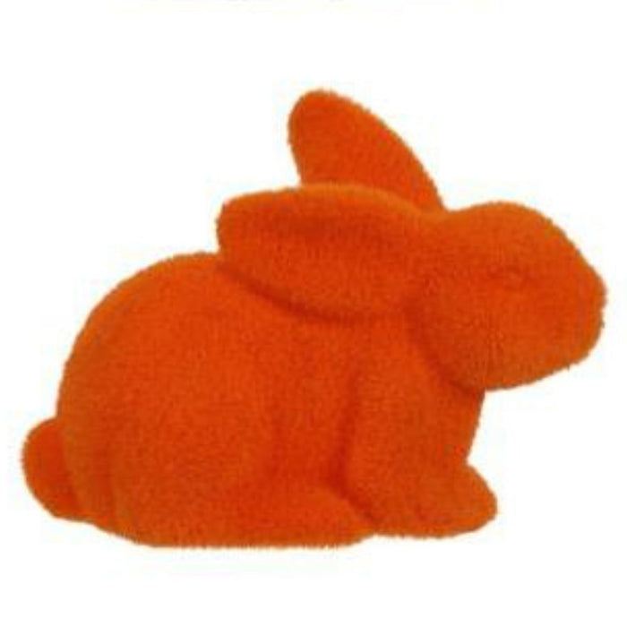 An 8.5L X 6H flocked orange rabbit figurine in a sitting position with ears tilted back highlights its vibrant hue.
