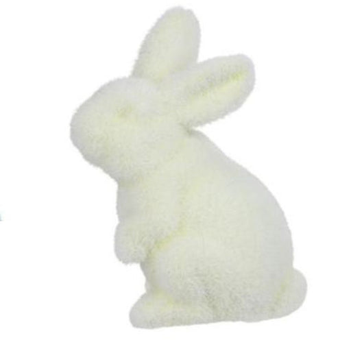 The 6Hx3.5L Flocked Standing Rabbit exudes cuddly charm with its elongated ears and soft flocked texture. Delicately facing left, it comes in six assorted pastel colors, contrasting gently with a plain white background. Product code: HE724098.