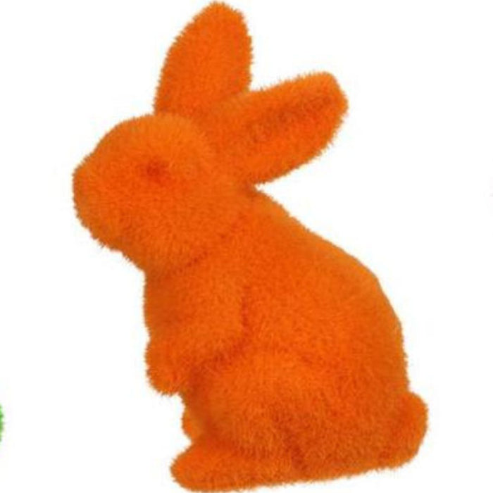 A 6Hx3.5L flocked standing rabbit in bright orange, crafted from polystyrene/nylon, displays its soft fur texture and perky ears against a plain backdrop. Model: HE724099.