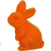 A 6Hx3.5L flocked standing rabbit in bright orange, crafted from polystyrene/nylon, displays its soft fur texture and perky ears against a plain backdrop. Model: HE724099.