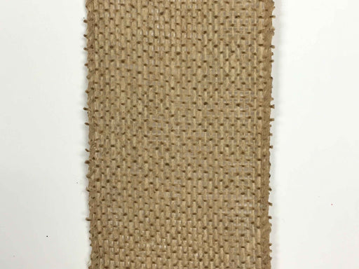 The Faux Nat Burlap 2.5" x 25 yd Ribbon (X501440-32B) features coarse, woven fabric with frayed edges, ideal for rustic crafts and creative projects. Displayed vertically on a white background.