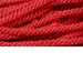 Close-up of intertwined red pipe cleaners on a white background, resembling the fuzzy, fibrous texture of Deco Flex Tubing Red Snowdrift RE322424. The vibrant red color and visible strands make it perfect for holiday creations.