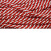 Close-up of red and white striped fabric with a textured appearance, reminiscent of braided yarn. This pattern, similar to the Deco Flex Tubing Red and White Snowdrift (RE3225G1), creates an intricate woven look on a white background—ideal for holiday creations.