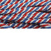Close-up of tightly coiled Deco Flex Tubing Red White Blue Snowdrift RE3225G3, showcasing intertwined stripes in a vibrant pattern resembling an artistic holiday creation.