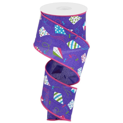 The 2.5" Kites on Purple Ribbon RGC13066A features vibrant kites and geometric patterns, with bright pink lined edges that add a contrasting and playful accent.
