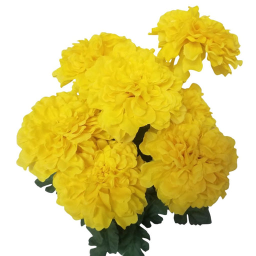 The 19 by 4 Golden Yellow Marigold Bush with 9 Stems SB7010-GYL showcases ruffled petals and lush green leaves, forming full, layered blooms. It creates a vibrant, cheerful bouquet reminiscent of a miniature marigold bush bursting with sunshine.