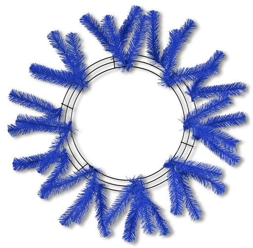 The 24 Work Wreath Royal Blue XX748825 features a minimalist design with tinsel branches on a circular metal frame. Branches are evenly spaced for a starburst pattern, leaving the center empty for elegance.