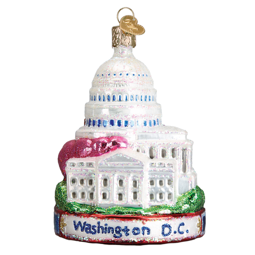 The Washington D.C. 20088 Old World Christmas Ornament is a decorative piece shaped like the U.S. Capitol, crafted from mouth-blown glass with glitter details, and features Washington D.C. in blue on the base—ideal for celebrating the Cherry Blossom Festival.