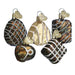 Experience the charming elegance of Old World Christmas with the Assorted Chocolates Christmas Ornament Set. These glossy ornaments feature silver and gold glitter patterns, gold loops for hanging, and a delightful heart-shaped charm on each piece.