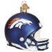 The Denver Broncos Helmet 71017 Old World Christmas Ornament is a beautifully hand-painted glass piece designed to resemble a dark blue football helmet. It displays the iconic white and orange horse logo on the side and includes a gold cap with a hook at the top, making it an ideal festive decoration for sports enthusiasts.