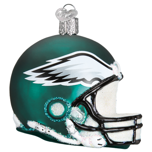 The Philadelphia Eagles Helmet 72517 Old World Christmas Ornament is a hand-painted glass ornament that captures the essence of the Philadelphia Eagles. It showcases a green and white football helmet design adorned with a wing emblem on the side and includes a silver loop for easy hanging.