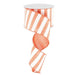 A spool of 2.5 Coral White Horizontal Stripe Ribbon RX914976 is elegantly unwound and twisted, showcasing its wired edges with alternating orange and white stripes against a plain white background.