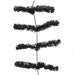 The Work Garland Black XX751902 is a sleek black bottle brush with a wire garland design, featuring multiple horizontal bristle sections on a central vertical wire. Its perfect for cleaning, thanks to its dense, evenly spaced bristles against a white background.