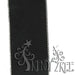 The 2.5 Erasable Chalkboard Ribbon in black, with a decorative white stitched border and stylized tree-like elements, offers the text TRENDY TREE, adding charm and versatility to any craft project.