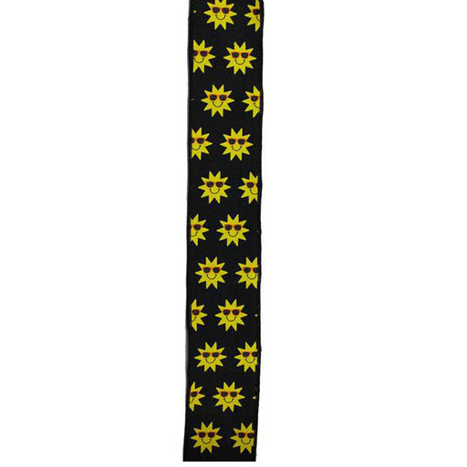 The 2.5 Sunshine Black Yellow Orange Ribbon (RGA137902) is a wired, black synthetic ribbon with rows of yellow sun motifs featuring pointed rays and circular centers.