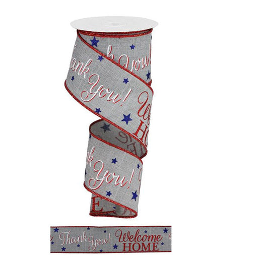 The 2.5 Light Grey Thank You Welcome Home Patriotic Ribbon (RGA167110) features red and blue text saying Thank you! Welcome HOME on a gray background with scattered blue stars. It has red edges, a polyester wire edge, and is shown partially unwound.