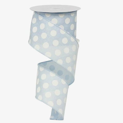 The 2.5" Medium Multi Dot Light Blue White Ribbon RX914675 is elegantly twisted in a spiral, showcasing its wire edge, and is attached to a pristine white spool.
