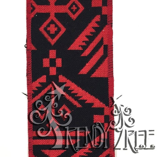 The 2.5 Red Black Woven Aztec X630240-12 features geometric patterns in black and red, including diamonds and zigzags, capturing the striking allure of an Aztec Print Ribbon. TRENDY TREE is displayed in stylized text in the bottom right corner.