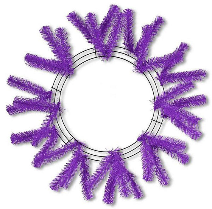 The Work Wreath 24" Purple XX748823 features evenly spaced purple artificial pine branches on a round frame, creating an ideal base for crafting your own unique purple wreaths.