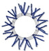 The 24" Pencil Wreath Metallic Royal Blue XX751125 features metallic royal blue pencil branches spaced evenly around the frame, forming a striking sunburst design against a white background.